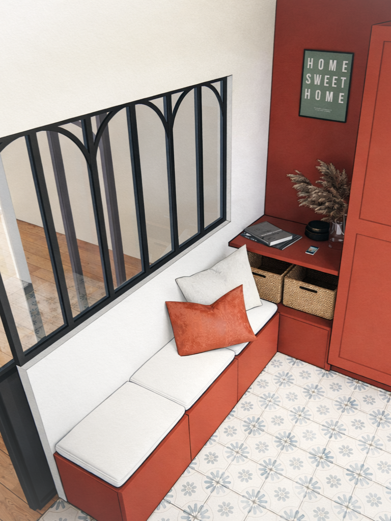 Vitrine en métal noir avec arches, mur rouge et coin salon confortable.